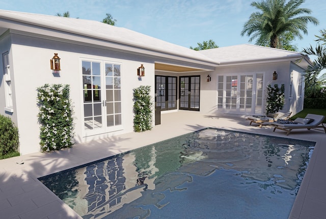 view of swimming pool featuring french doors and a patio