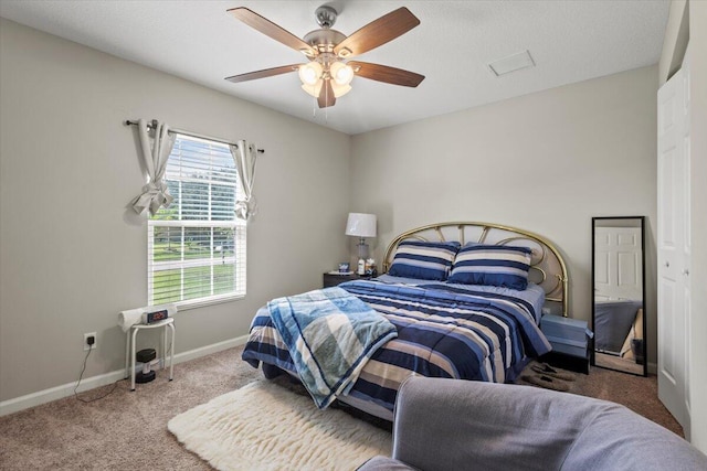 bedroom featuring carpet and ceiling fan