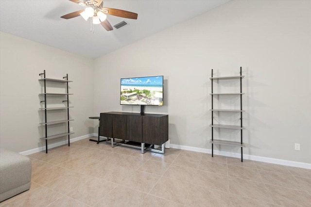 miscellaneous room with lofted ceiling, light tile patterned floors, and ceiling fan