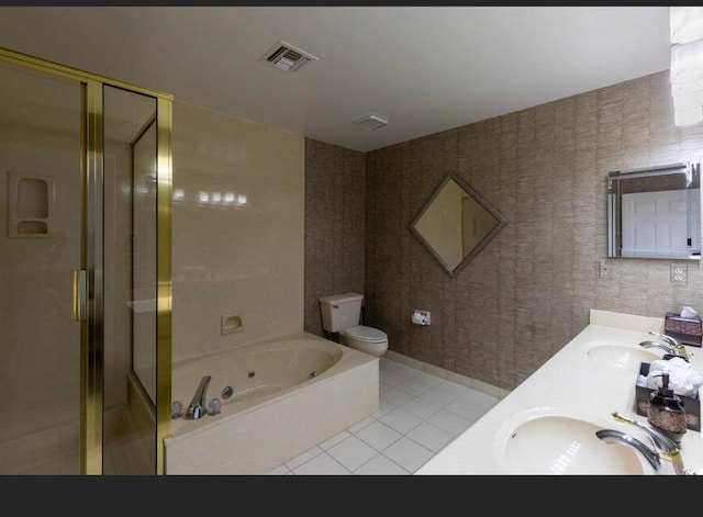 full bathroom with vanity, toilet, tile patterned floors, and independent shower and bath