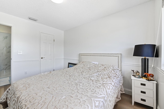 bedroom with a textured ceiling