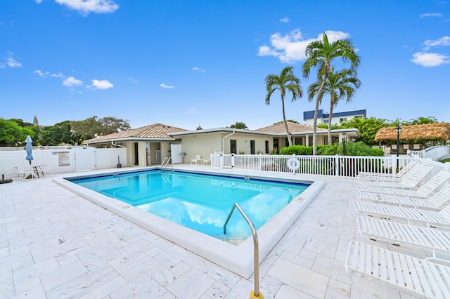 view of pool featuring a patio