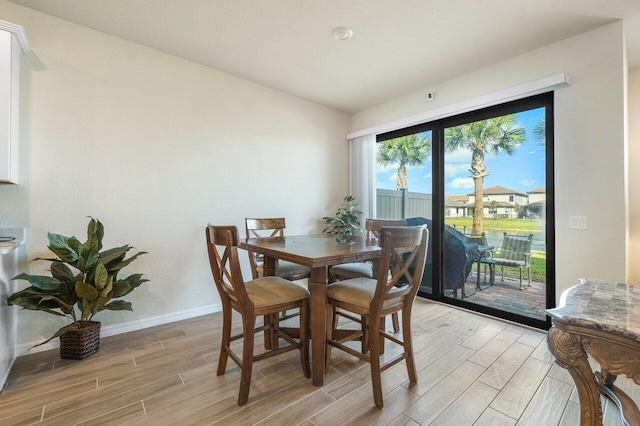 dining room featuring light wood-type flooring