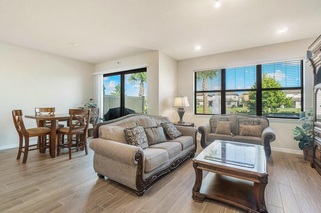 living room with light hardwood / wood-style floors