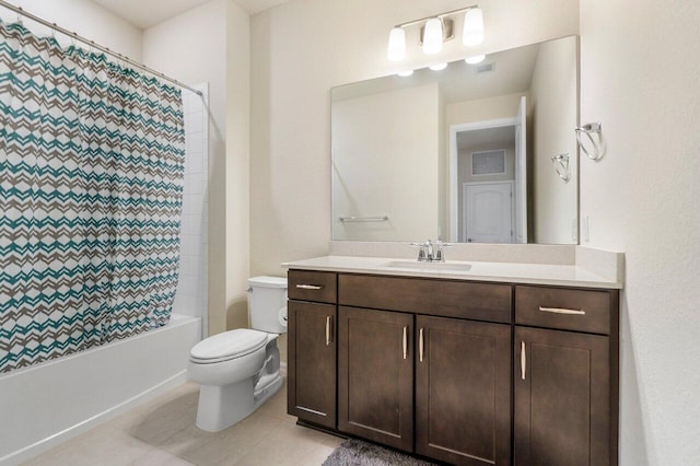 full bathroom featuring toilet, shower / bath combo with shower curtain, vanity, and tile patterned flooring