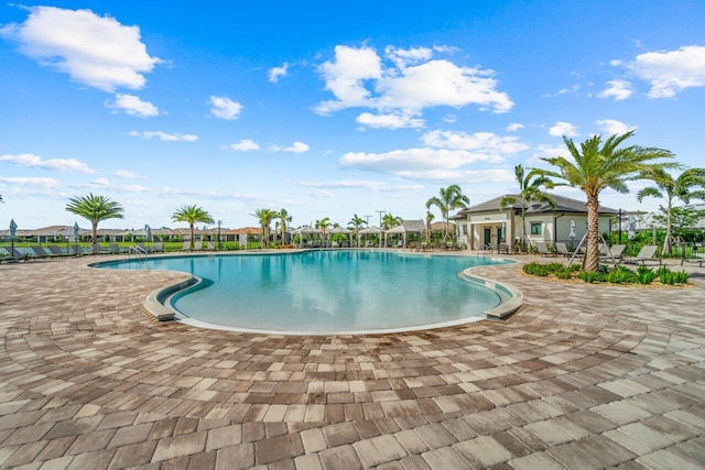 view of swimming pool with a patio area