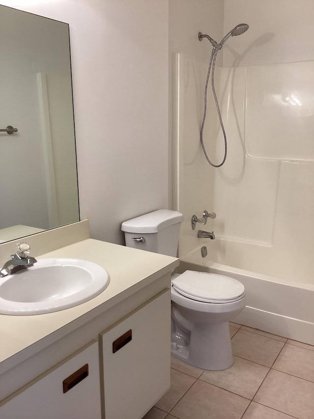 full bathroom featuring toilet, bathtub / shower combination, vanity, and tile patterned floors