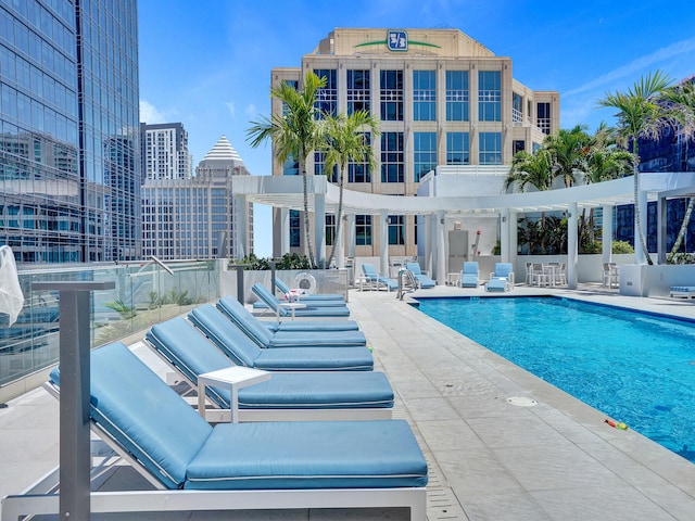 view of swimming pool featuring a patio area and outdoor lounge area