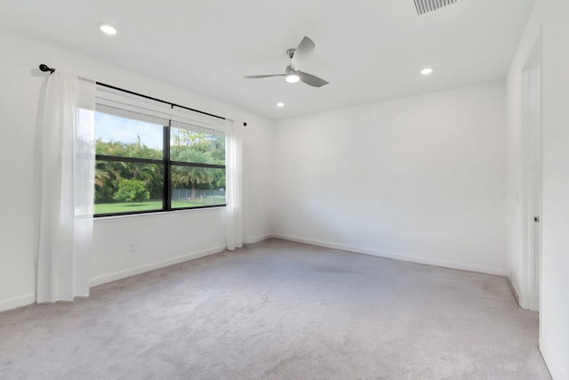 carpeted empty room with ceiling fan