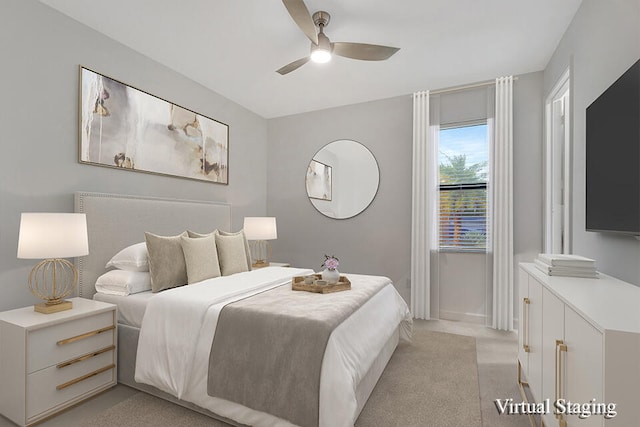 carpeted bedroom featuring ceiling fan