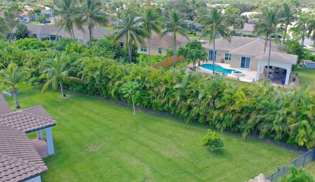 view of yard featuring a fenced in pool and a patio area