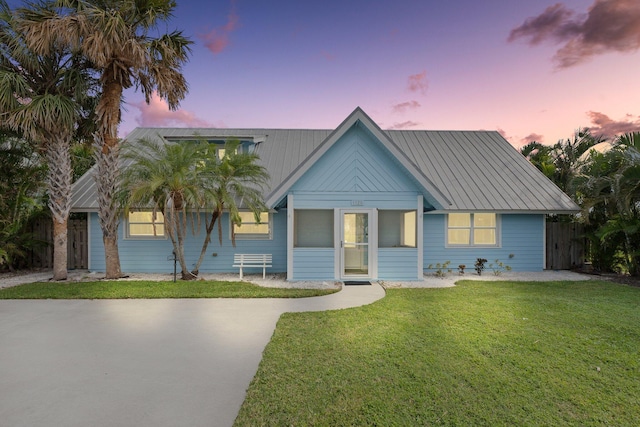 view of front of house with a lawn