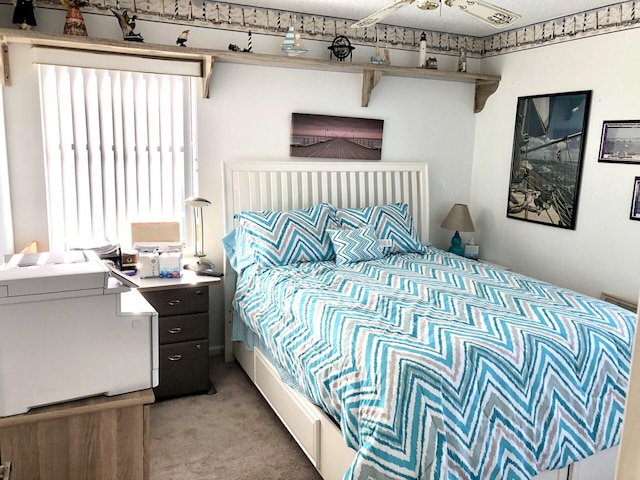 bedroom featuring light colored carpet