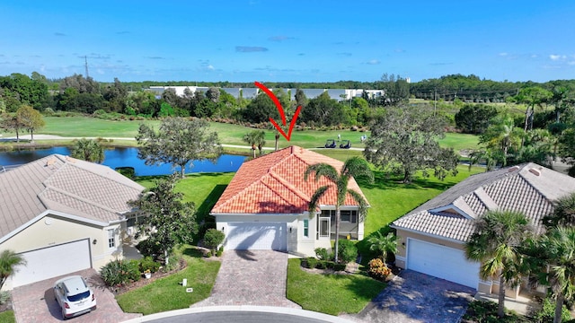 birds eye view of property featuring a water view