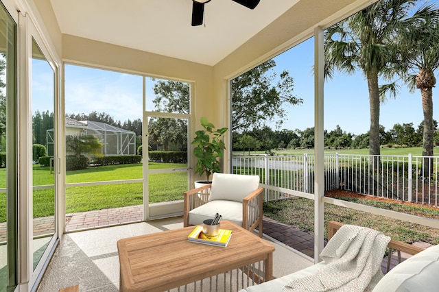 sunroom / solarium with ceiling fan