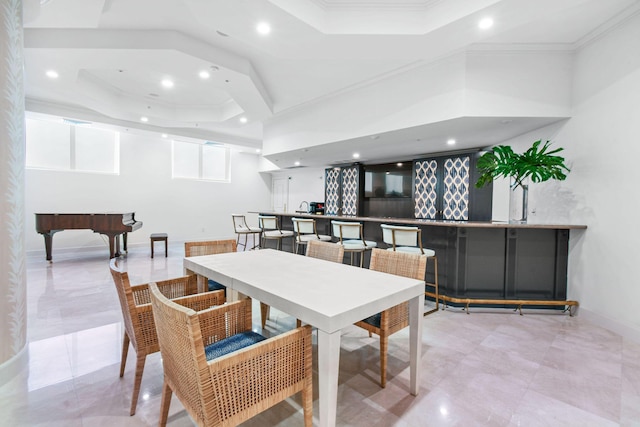 dining area featuring a raised ceiling, crown molding, billiards, and bar area