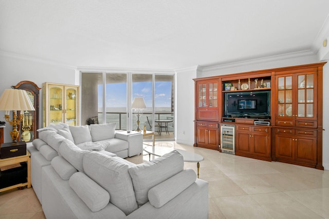 living room featuring light tile patterned floors, crown molding, and wine cooler