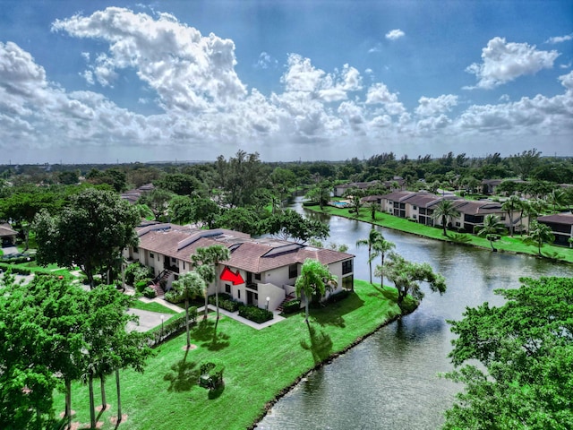 bird's eye view with a water view