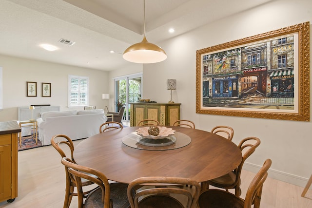 dining area featuring light hardwood / wood-style floors