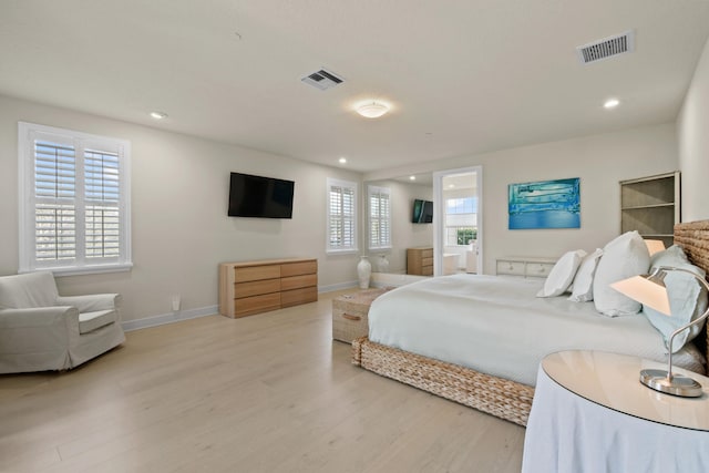 bedroom featuring light wood-type flooring