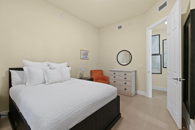 bedroom featuring light wood-type flooring