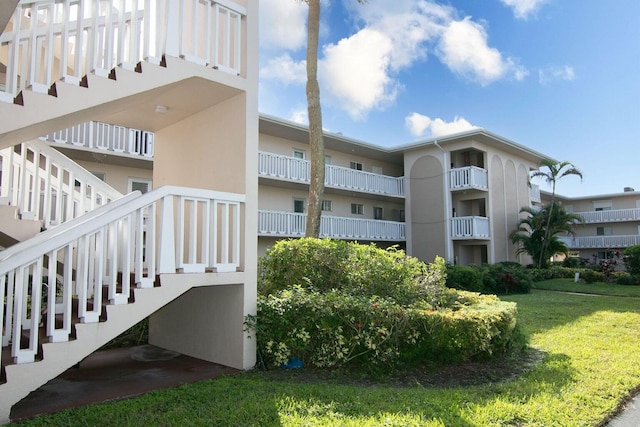 view of building exterior featuring stairway