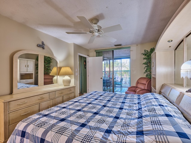 bedroom with ceiling fan, a textured ceiling, and access to exterior