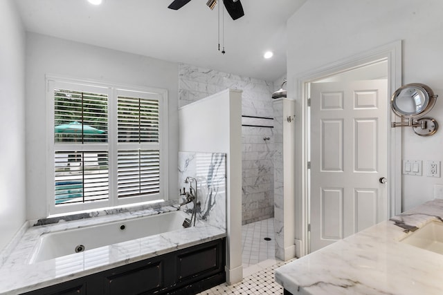 bathroom with vanity, ceiling fan, tile patterned flooring, and plus walk in shower