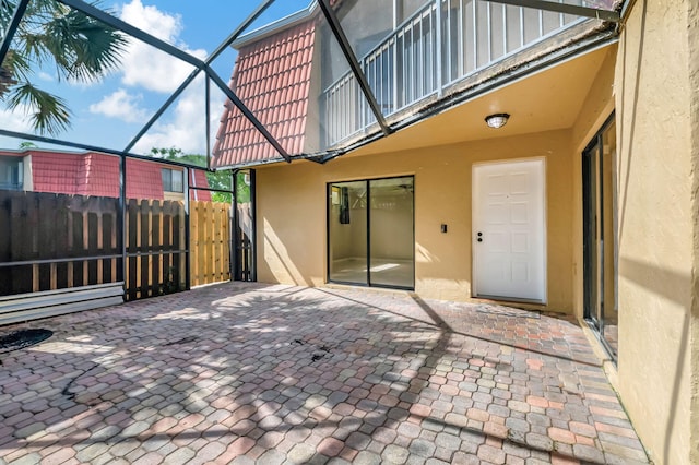 view of patio with a lanai