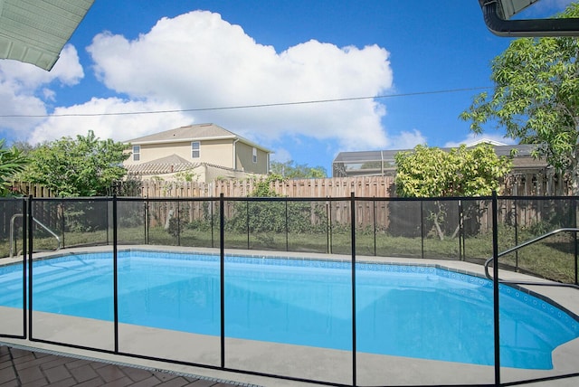 view of swimming pool featuring fence private yard and a fenced in pool
