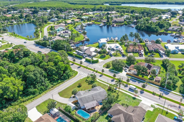 bird's eye view with a water view