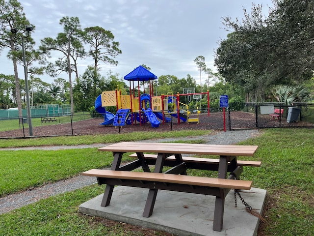 view of jungle gym featuring a yard