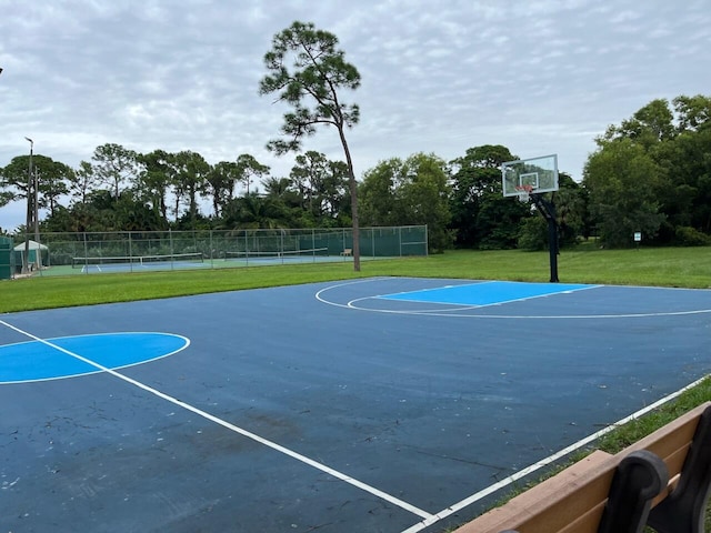 view of sport court with tennis court