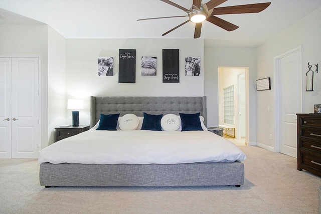 carpeted bedroom with ceiling fan