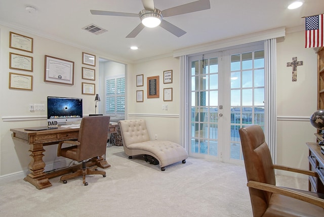 carpeted office space with ornamental molding, french doors, and ceiling fan