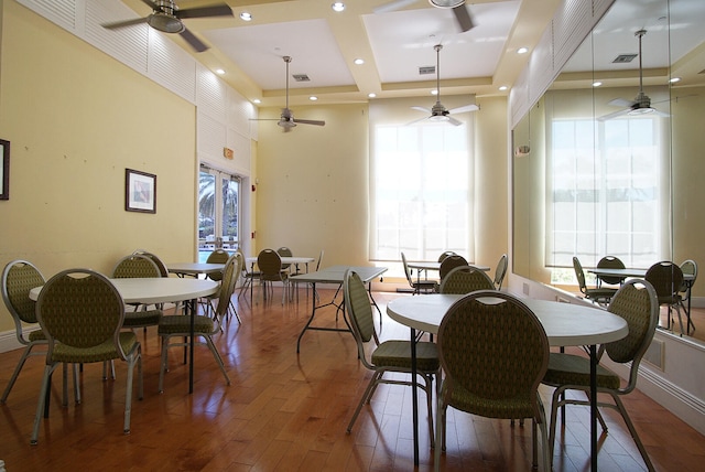 dining area featuring hardwood / wood-style floors and ceiling fan