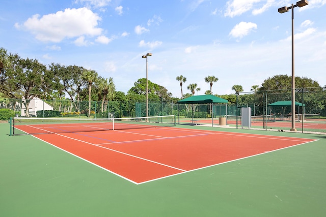 view of sport court with community basketball court and fence