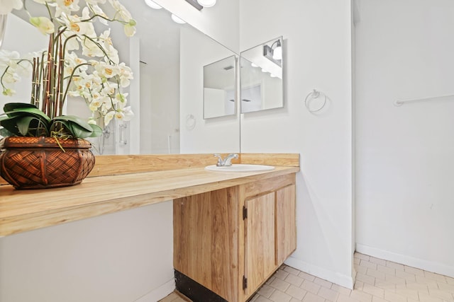 bathroom featuring vanity and tile patterned floors