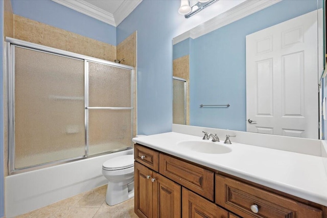 full bathroom featuring ornamental molding, vanity, shower / bath combination with glass door, tile patterned flooring, and toilet