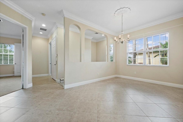 unfurnished room with ornamental molding, light tile patterned floors, and an inviting chandelier