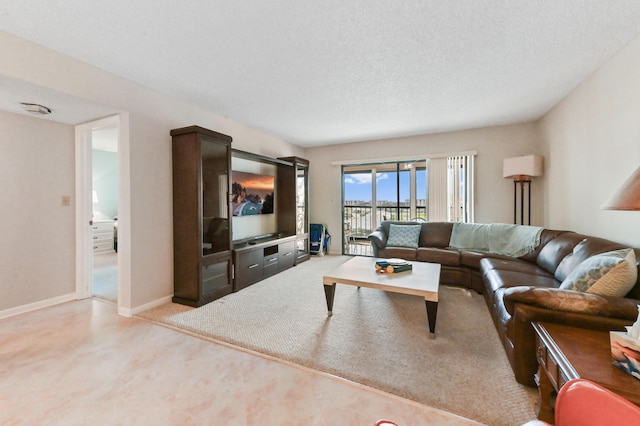 living room with a textured ceiling