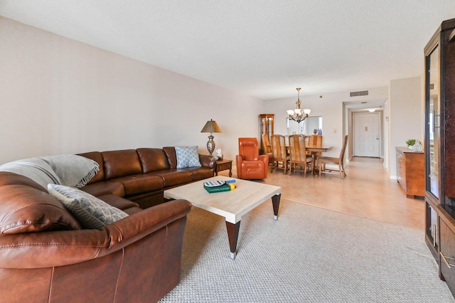 living room featuring an inviting chandelier