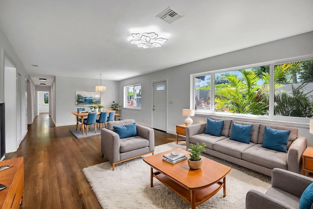 living room with dark hardwood / wood-style floors