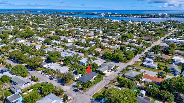 drone / aerial view featuring a water view