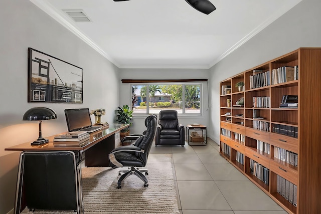 home office featuring light tile patterned floors and crown molding