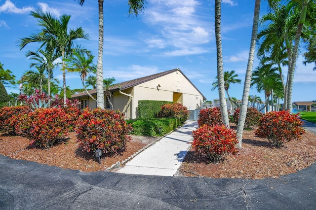 811 Sky Pine Way Unit D2, Greenacres, FL 33415 - view of front facade with stucco siding