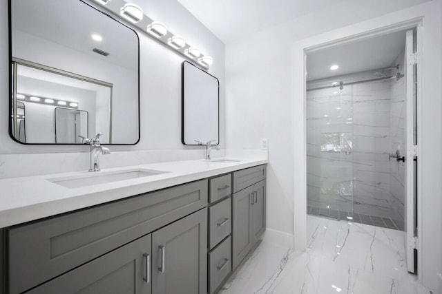 bathroom with vanity and an enclosed shower