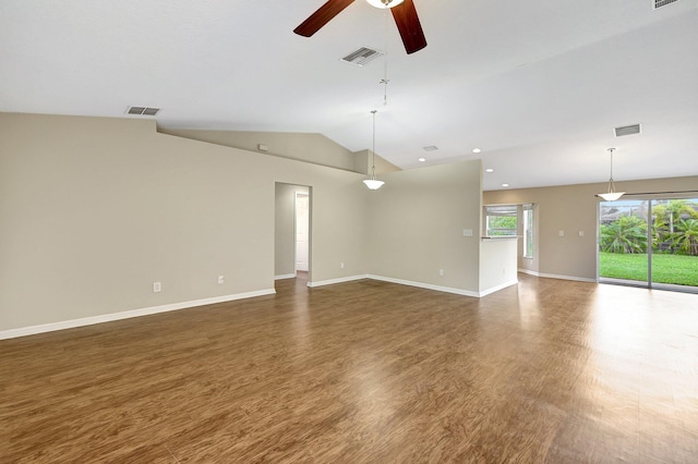 unfurnished room with ceiling fan, dark hardwood / wood-style floors, and vaulted ceiling