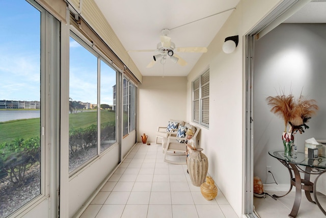 sunroom / solarium with ceiling fan