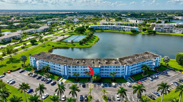 birds eye view of property featuring a water view